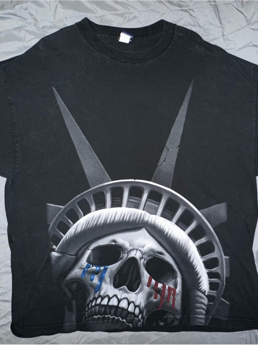 Black Graphic Tee with Statue of Liberty Skull and Red & Blue Accents